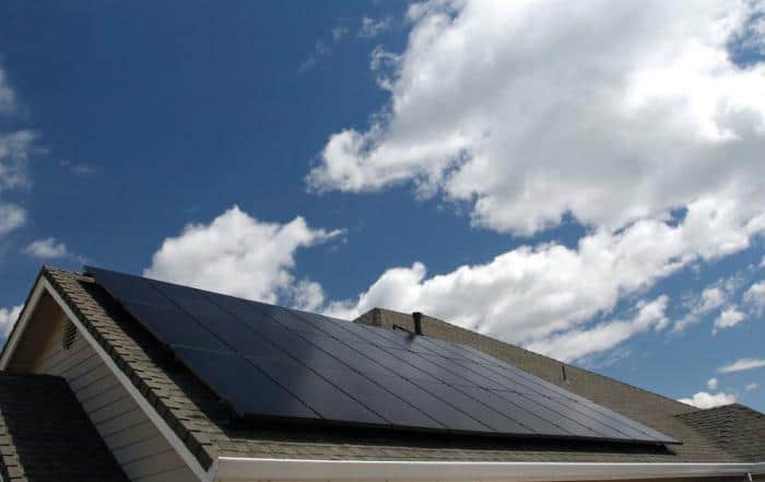 Solar vs. Wind Energy- Which Alternative Energy Source is Right for Your Home? Solar array on a home by Sunergy Systems.